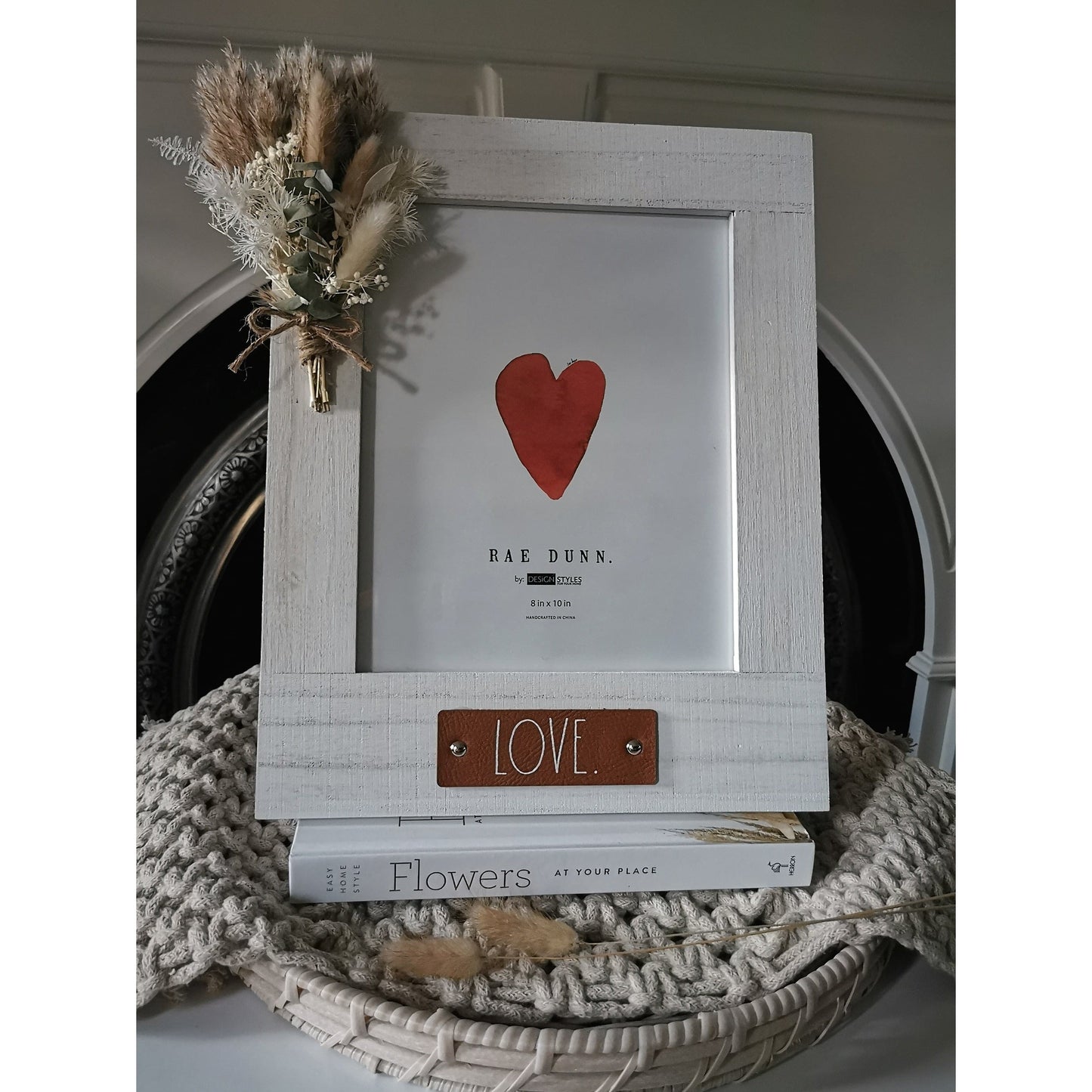 Phoeo frame with mini natural posy and 'love' leather look badge 